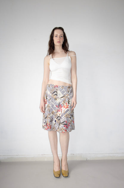 004 / John Galliano Newspaper Skirt